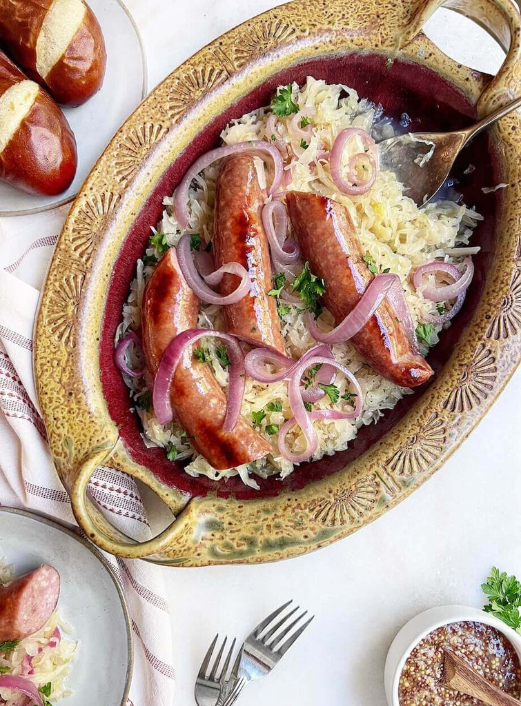 onions-sauerkraut-and-Polish-sausage-in-a-tan-dish-920 - Pierogi Store