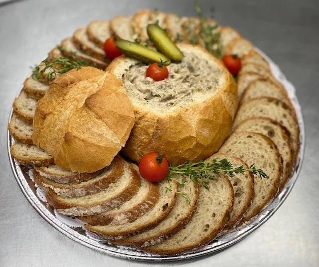 Lard in Bread Bowl surrounded by bread slices. Non-lard items not included.